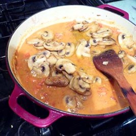 add mushrooms and simmer gently